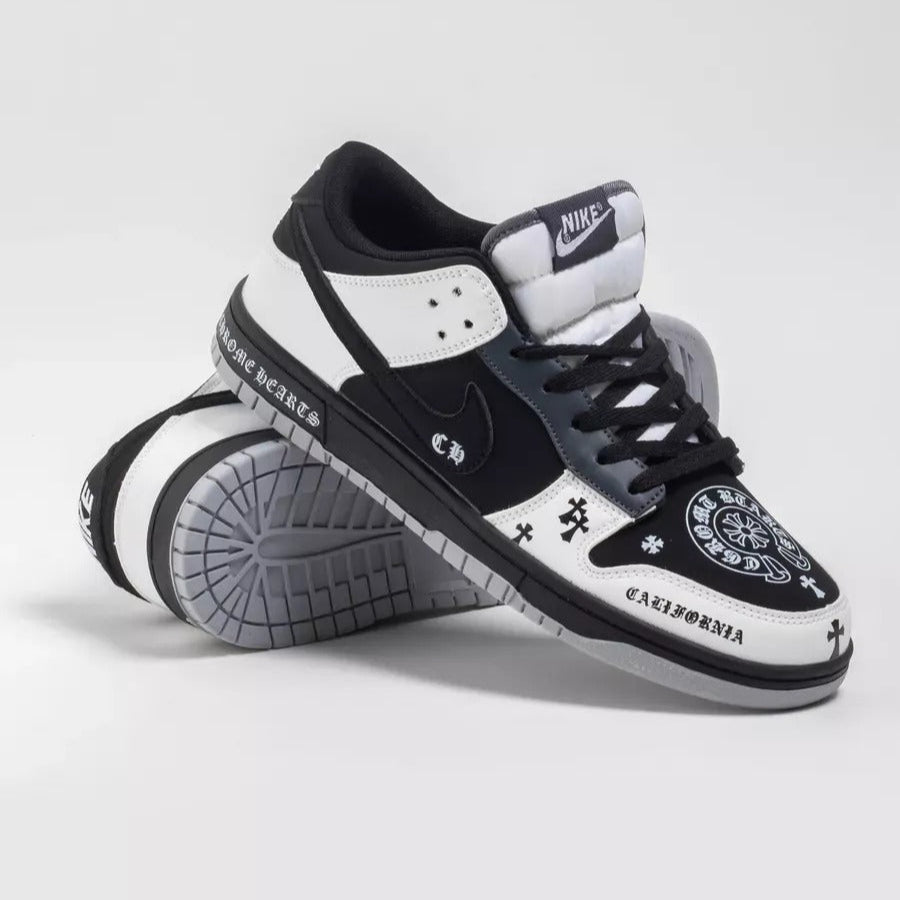 Black and white sneakers with unique design on a light gray background